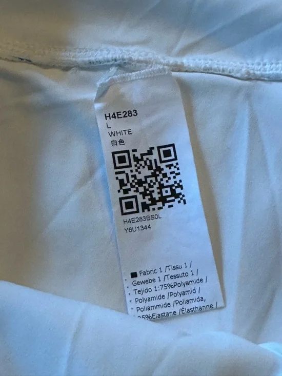 Pleated Floral Mini Skirt with shorts in White with Blue Flower Print Large - Picture 4 of 4